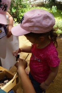 Hayden touching a butterfly