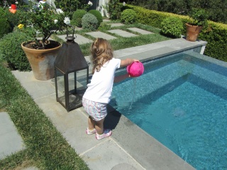 Hayden dumping water into the whirlpool