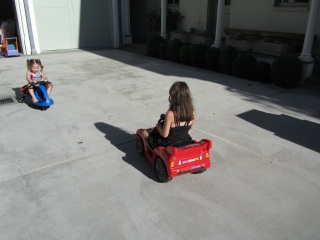 Camryn driving the Lightning McQueen Car