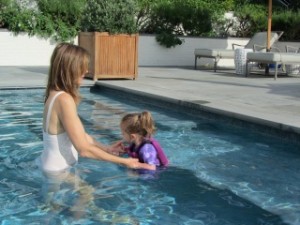 Hayden swimming with Jena